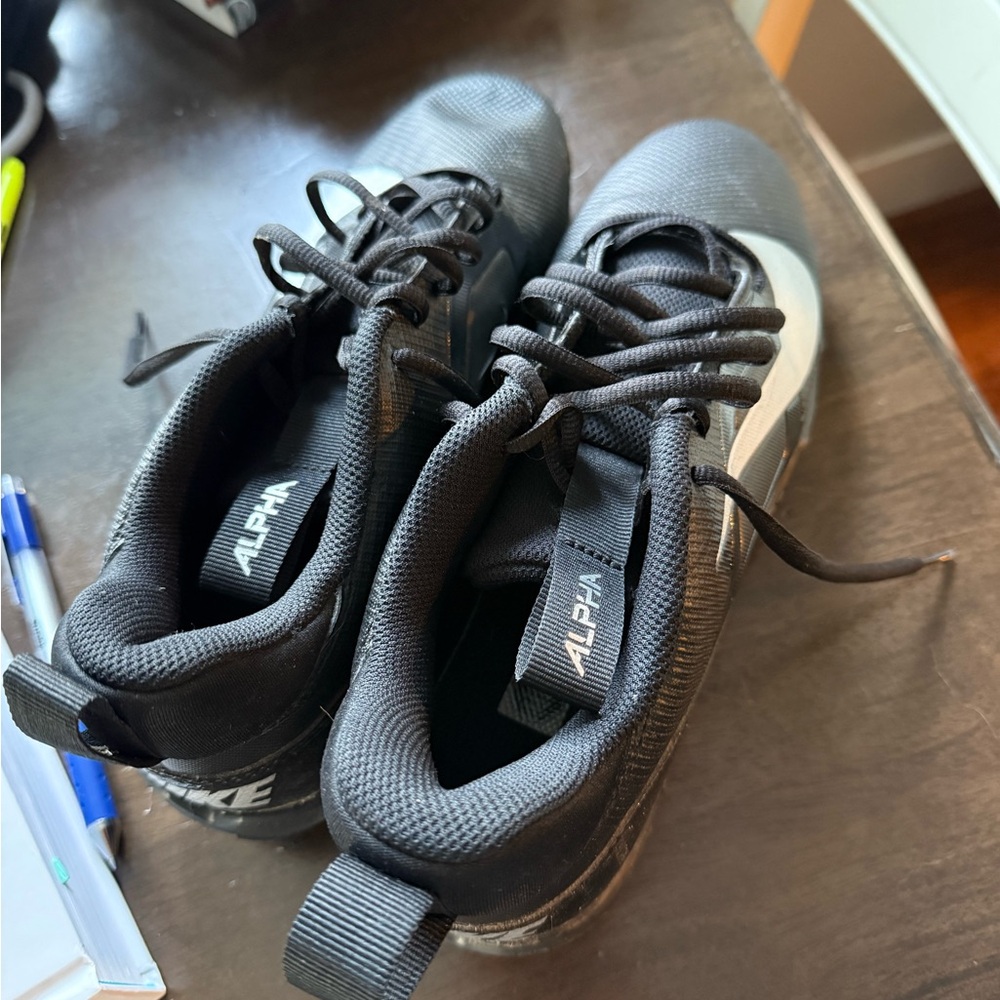 Nike Alpha Black and White Trainers